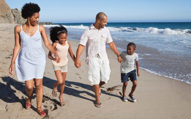 Black family on the beach (Jumia Travel)