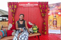Miss Kellen matildah poses for a photo at Tusker cider tent during the Bomas of Kenya
