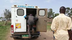 File image of individuals showing symptoms of anthrax taken to hospital in an ambulance