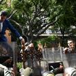 Venezuelan opposition leader and self-proclaimed acting president Juan Guaido is pushed back by police with riot shields as he tries access the National Assembly compound