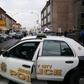 Police gather evidence a day after a deadly shooting at a Jewish deli in the New York suburb of Jersey City