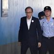 Former South Korean president Lee Myung-bak arriving at court to attend his original trial in 2018