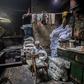 Salama Mahmoud Salama, 83, in his traditional hand-dying workshop in Cairo's centuries-old Darb al-Ahmar district