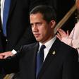 Venezuelan opposition leader Juan Guaido waves as he is acknowledged by US President Donald Trump during the State of the Union address