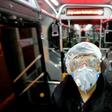 A worker cleans a bus in the Iranian capital Tehran as part of efforts to prevent the spread of coronavirus