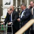 Disgraced Hollywood mogul Harvey Weinstein leaves a court hearing in New York using a walking frame