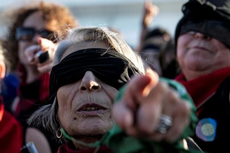 Some 10,000 women took part in the performance, according to Santiago officials