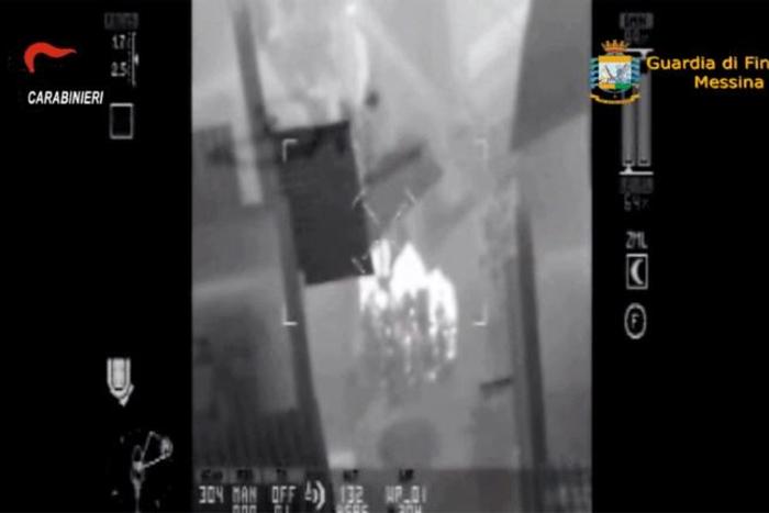 A thermal image taken from a helicopter shows suspects being tracked as part of an anti-Mafia operation in Sicily