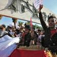 In Baghdad, hundreds of students flooded the streets around the main protest camp of Tahrir Square, demonstrating against Allawi's appointment