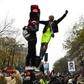 Protesters take part in a demonstration against the pension overhauls, on Place de la Nation in Paris, on December 5, 2019