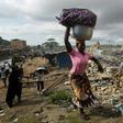 Residents of the Boribana neighbourhood in Abidjan salvage belongings as demolition of the district gets underway