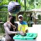 Young Upe men cast their votes in the Bougainville Referendum at the men's only polling station in Teau Bougainville, Papua New Guinea.