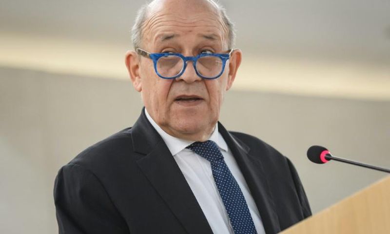French Foreign Minister Jean-Yves Le Drian and the foreign ministers of 13 other EU countries warned that what Moscow has presented as a fight against terrorism did not justify "massive violations of international humanitarian law"