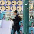 Commentators expect disillusionment among voters in sanctions-hit Iran to result in a low turnout in Friday's parliamentary election despite government appeals for a show of unity
