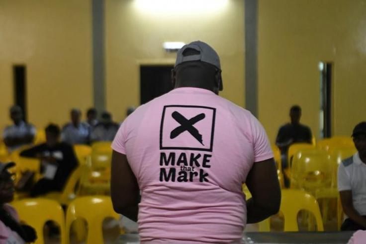 Contested election: A polling officer in Gaborone verifies ballots on voting day last October