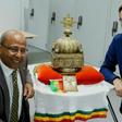 Dutch-Ethiopian Sirak Asfaw, left, and art detective Arthur Brand pose with the crown at a high-security facility in the Netherlands in September last year