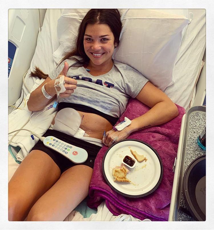 Here I am posing with my ileostomy bag after one of my many surgeries. (It