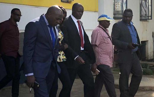 Migori Governor Okoth Obado with his lawyers