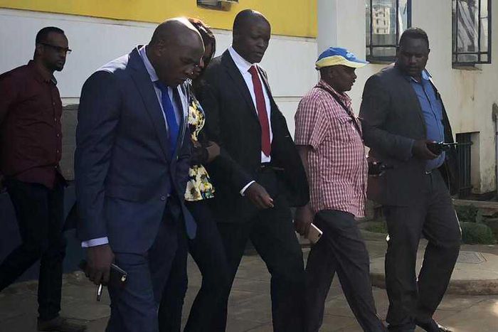 Migori Governor Okoth Obado with his lawyers