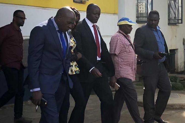Migori Governor Okoth Obado with his lawyers
