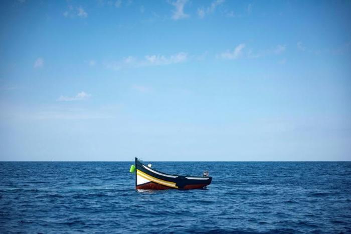 Migrants often set out on simple wooden boats for dangerous sea voyages that can cover many hundreds of miles