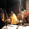 Malian kora players with an instrument similar the one played by Sissoko