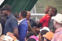 Moses Kuria making his way to the dais