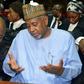 Sambo Dasuki (R) is accused of siphoning money earmarked for the fight against Islamic militant group Boko Haram and allegedly using it to help bankroll former president Goodluck Jonathan's failed re-election campaign in 2015