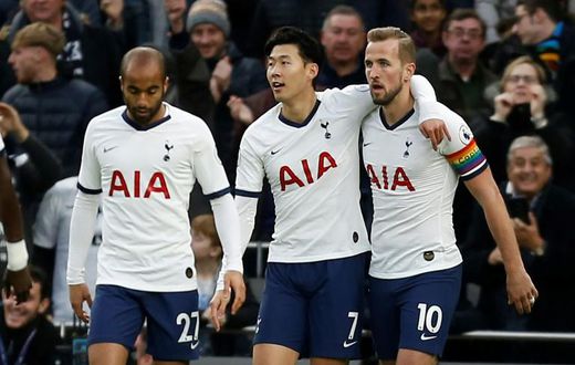 Tottenham players celebrate their opening goal in the Premier League match against Burnley