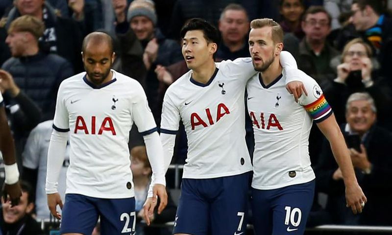 Tottenham players celebrate their opening goal in the Premier League match against Burnley