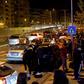 Residents gathered outdoors in Tirana