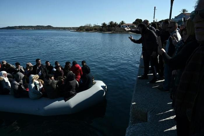 Shouting "Go back to Turkey", furious locals at the port of Thermi blocked migrants from landing