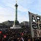 Demonstrators in the capital on Saturday  broke shop windows along their protest route, set fires and threw projectiles at police in riot gear who responded with tear gas