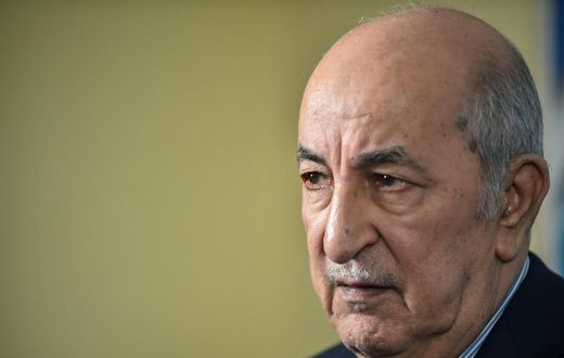 Algerian President Abdelmadjid Tebboune, seen here, said the arrest of his son was to "punish" him for his attack on oligarchs while premier