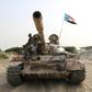 Fighters of the UAE-trained Security Belt Force, dominated by members of the secessionist Southern Transitional Council (STC), ride atop a tank in Yemen's southern coastal town of Shuqrah, east of Aden, in August this year