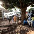Officials count first-round votes at a polling station in the popular Bairro Militar area of Bissau in November 2019