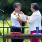 Bogota's incoming Mayor Claudia Lopez (L) is presented with the mayoral sash during her inauguration