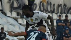 Adebayor (top) made his Olimpia debut on Sunday