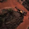 Emergency crews use an amphibious vehicle and heavy machinery in May 2019 to pick through mud and search for bodies, 99 days after the collapse of the Corrego do Feijao Dam in Minas Gerais