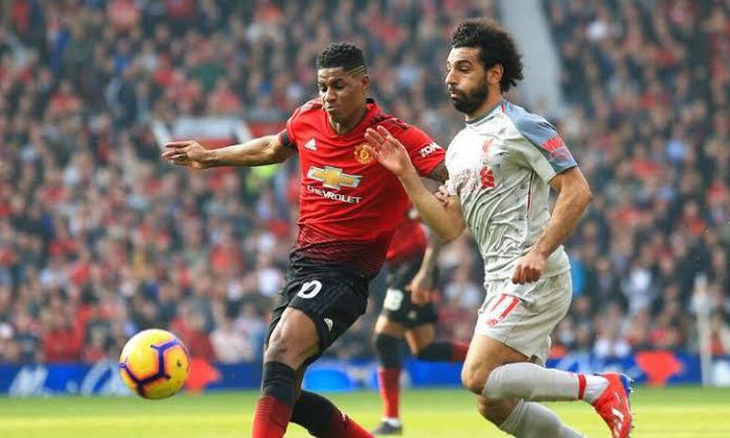 Marcus Rashford and Mohamed Salah during a previous match