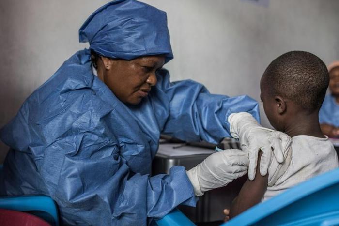 A girl gets inoculated with an Ebola vaccine (pictured November 2019), in Goma, Democratic Republic of Congo