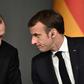 French President Emmanuel Macron, right, has been called accused of "sponsoring terrorism" by the foreign minister of Turkish leader Recep Tayyip Erdogan
