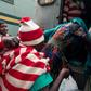 Marry Mubaiwa the wife of Zimbabwe vice-president Constantino Chiwenga covered her head when she was arrested
