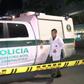 A police forensics van at the scene where a French defense systems engineer was shot dead in Bogota, Colombia
