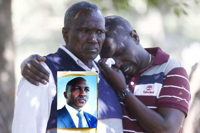 Kipyegon Kenei's father, John Chesang with a relative in Nakuru