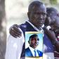 Kipyegon Kenei's father, John Chesang with a relative in Nakuru