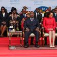 Gabon's President Ali Bongo and the First Lady attend a ceremony in August 2019. Bongo's then cabinet director Brice Laccruche Alihanga is second to the right behind the presidential couple