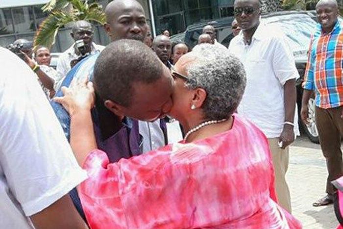 Uhuru playing Golf at Royal Club with Margaret Kenyatta at night