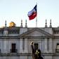 A demonstrator in front of the presidential palace during a protest against Chilean President Sebastian Pinera's government on December 20, 2019