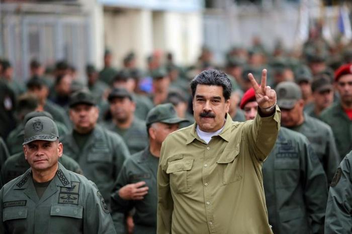 Remigio Ceballos, a senior Venezuelan admiral hit by US sanctions, walks to the left of President Nicolas Maduro during a January 2019 military rally
